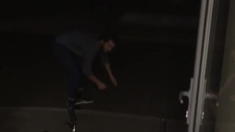 Guy in blue shirt in wheelchair pushed down stairs