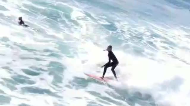 The guy's really good at surfing, it's cool,