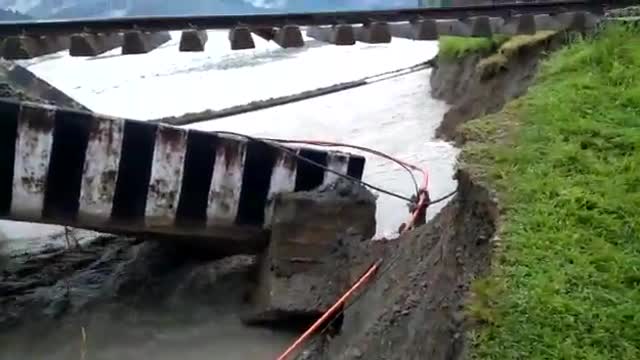 Excess Rain - Bridge Washes Away