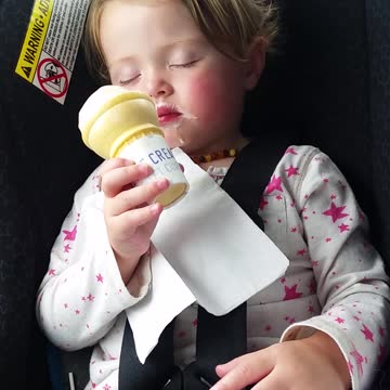 Little Girl Takes Nap Mid-Ice Cream Cone