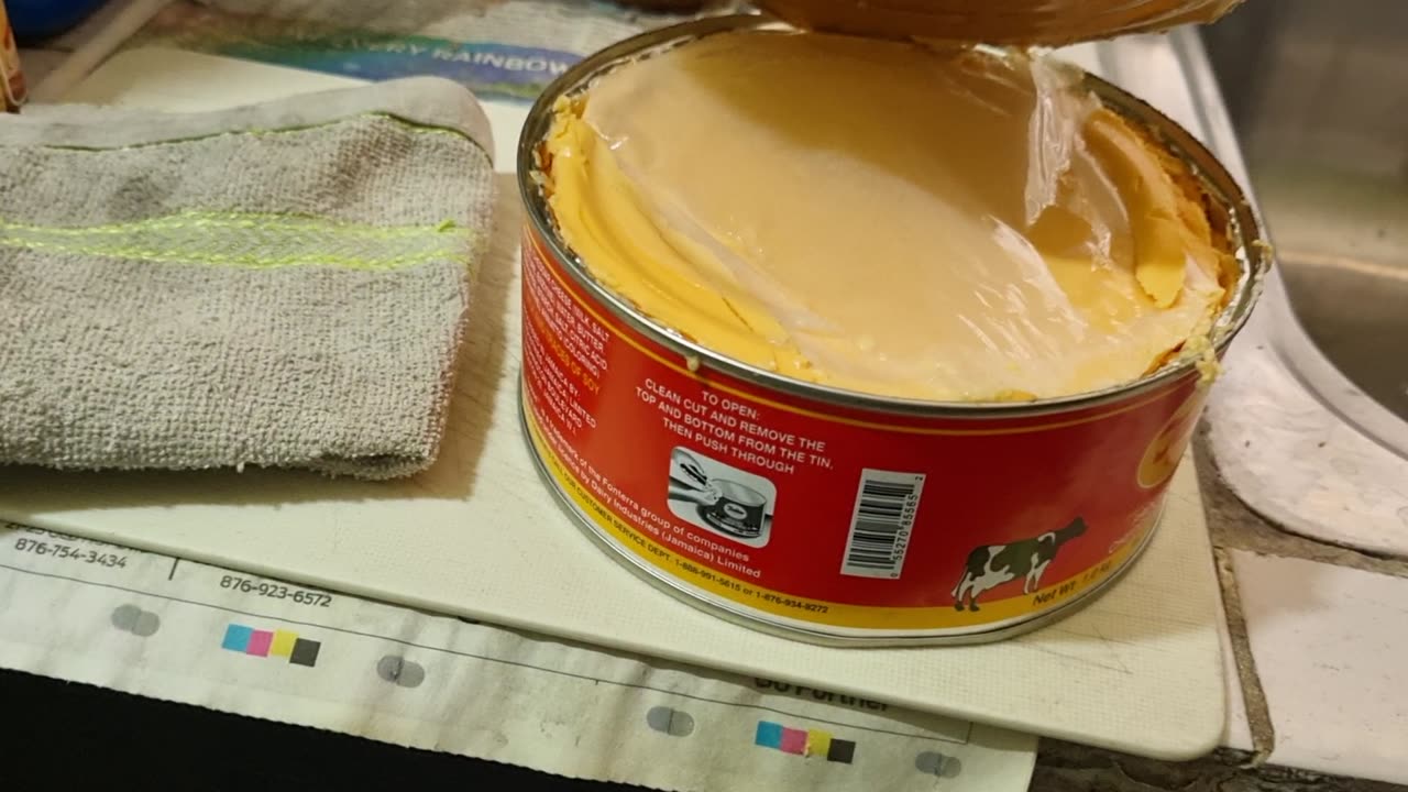 How the Tivoli Gardens High Physics Teacher uses a knife to open a Tin of Tastee Cheese