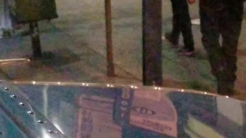 Man Smashes Bag on Sidewalk