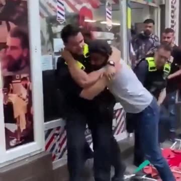 The German police explain to Mohammed that women do not touch each other