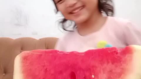 Cute Baby eating watermelon