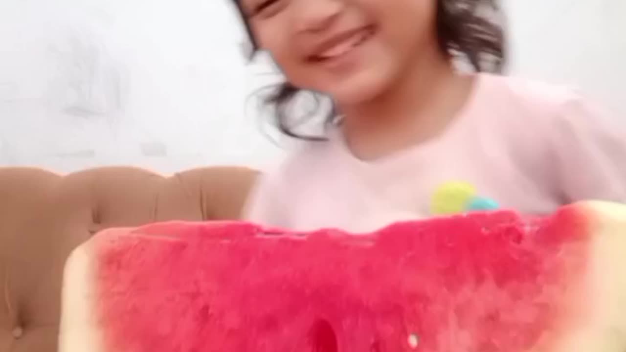 Cute Baby eating watermelon