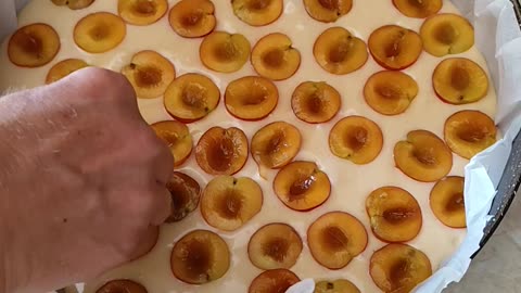 Fruits peel down on cake and cinamone with sugar on top