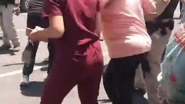 Video from Uvalde a parent's being held back by law enforcement