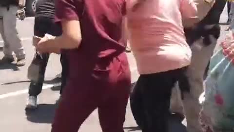 Video from Uvalde a parent's being held back by law enforcement