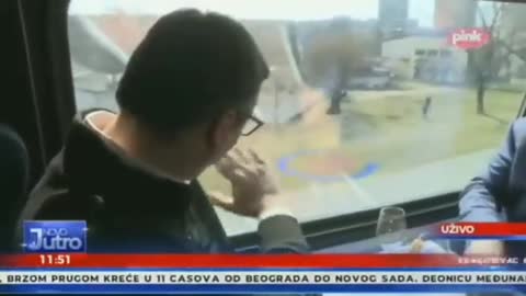 Serbia’s President Pretending There’s A Crowd Outside, Waving At NO ONE!