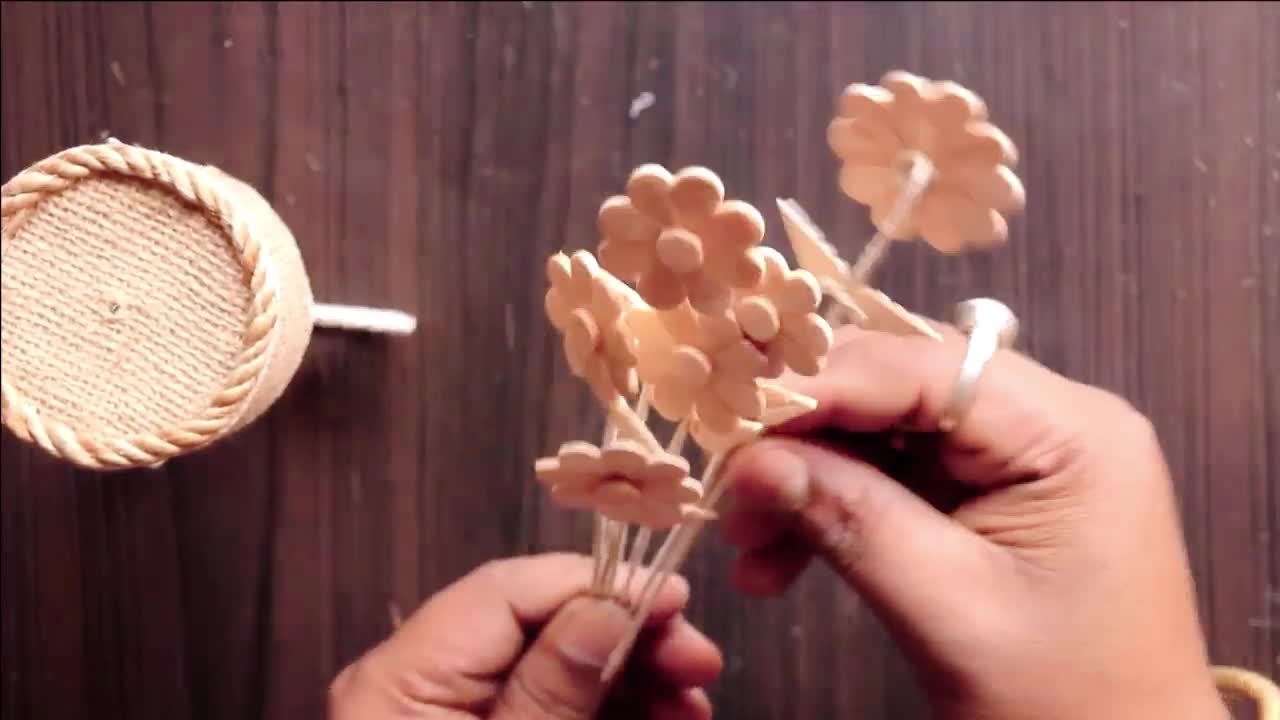 A wooden flower will complete the task