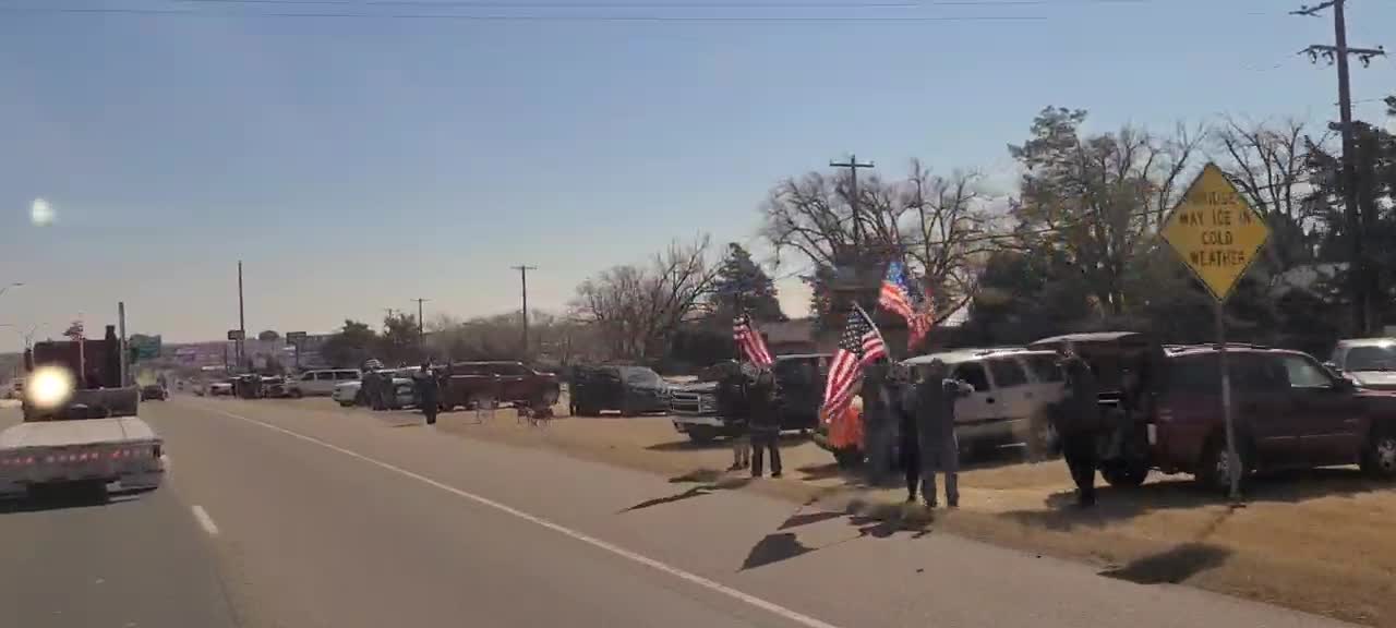 Peoples convoy driving through Amarillo TX