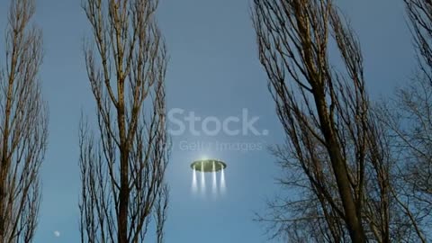 UFO flies over the forest and captured man in the light beam.