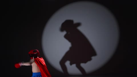 A Boy in a Heroic Costume