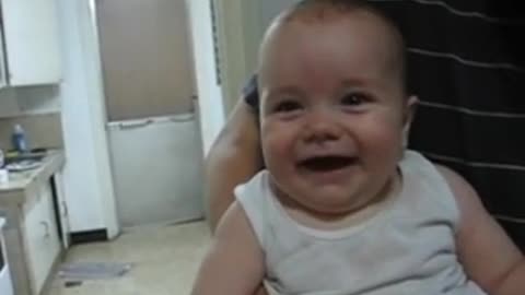 Adorable Baby can't stop laughing LOL