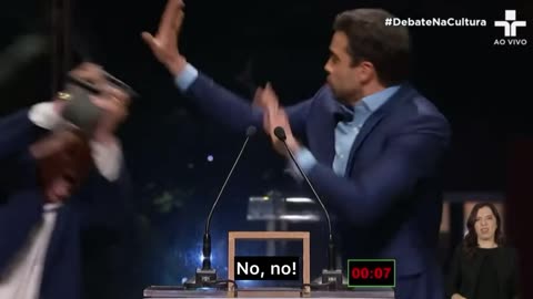 WOW: Candidate Gets Assaulted By Opponent With Chair During Debate In Brazil