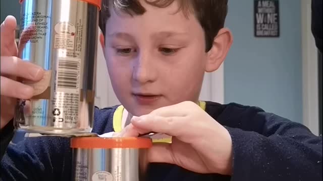 Young Magician Stuns Dad With Magic Can Trick