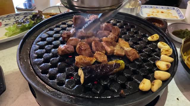 Korean BBQ is grilled on a special grill.