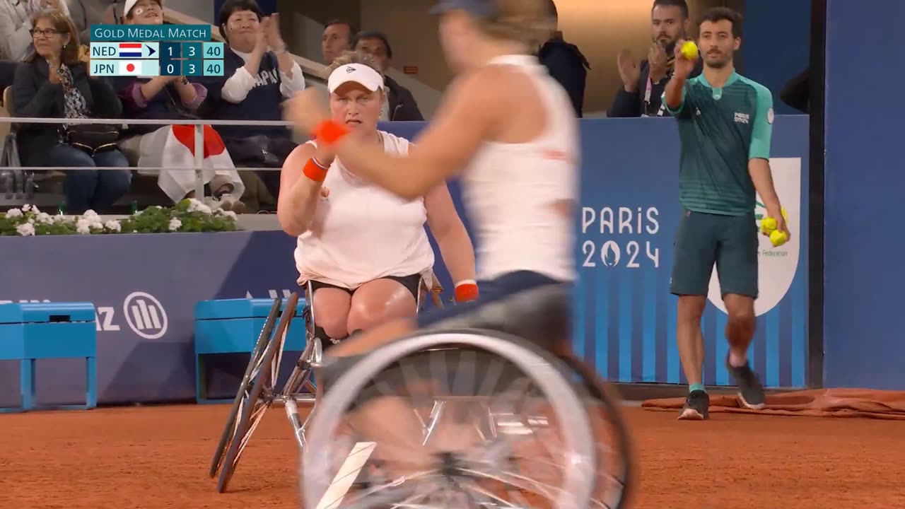 Intense Rally in Women's Wheelchair Tennis Doubles Final: Netherlands vs Japan