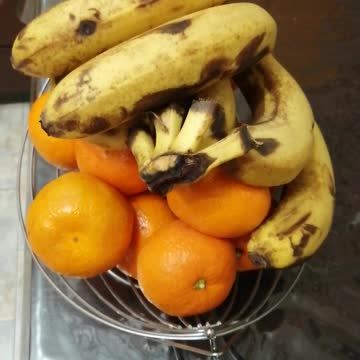 Tasty bananas with tangerines.