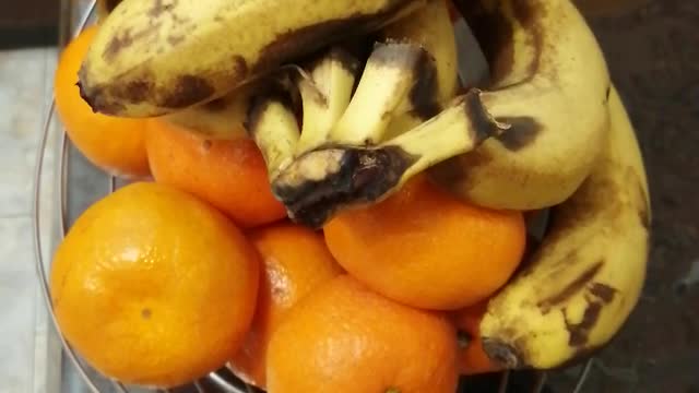 Tasty bananas with tangerines.