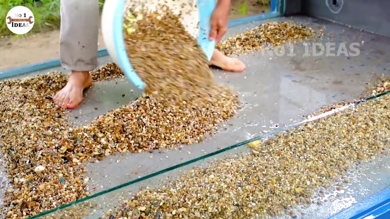 由水泥和玻璃制成的杰作! 美丽的户外水族箱床