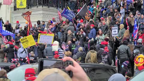 US Capitol Protester with Joe Biden and a Bag of Ballots