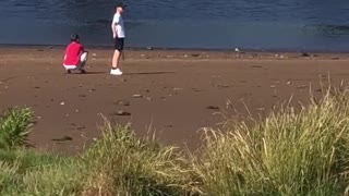 Man in Speedo Takes a Leisurely Stroll