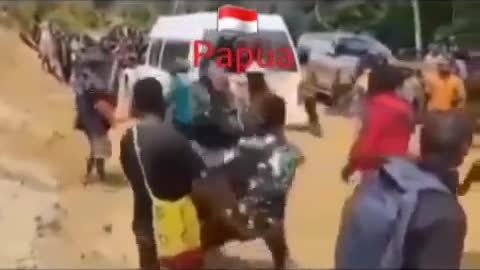 Indonesian Papuans destroying vaccine trucks.
