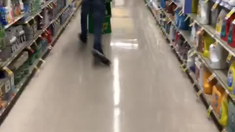 Guy runs into a grocery stand and knocks it down