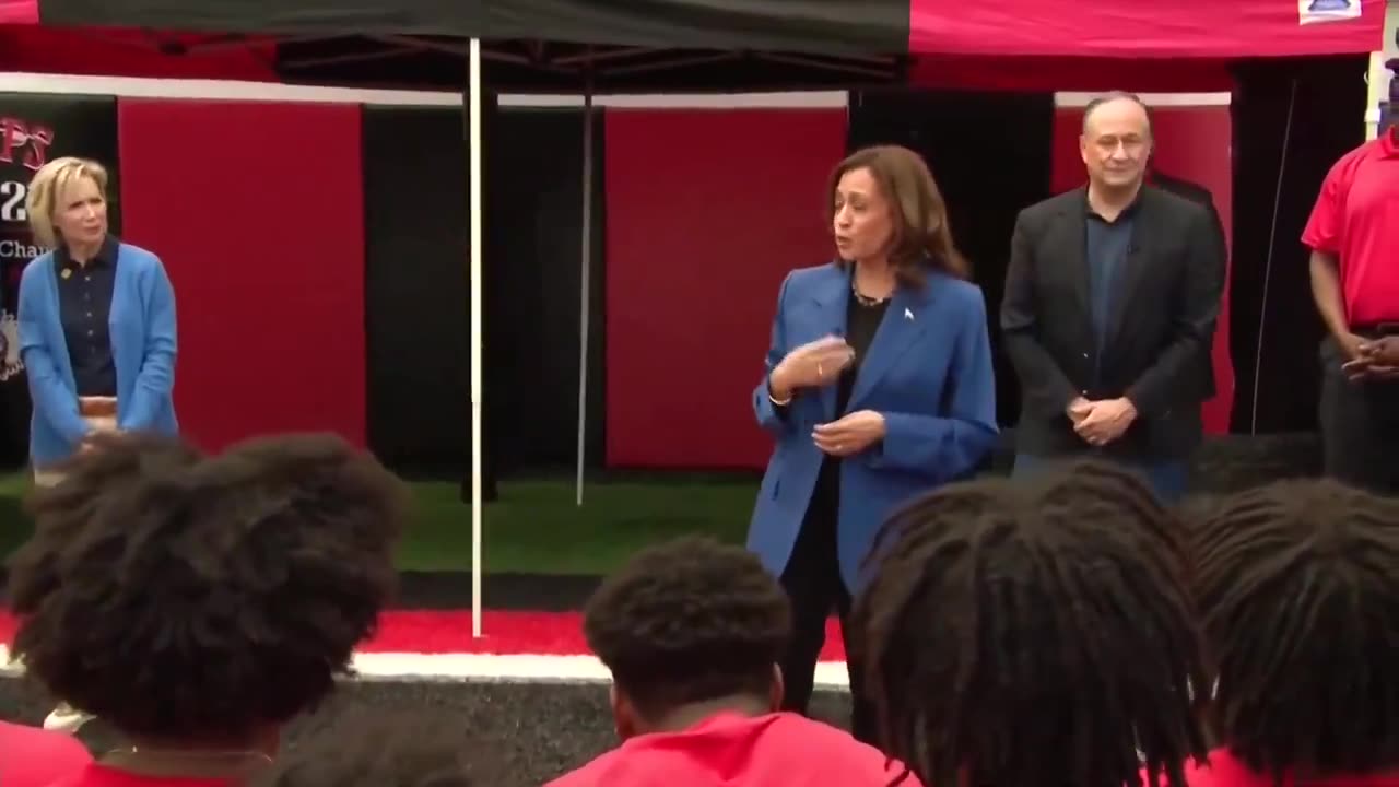 poor high school football players are being forced to listen to a “motivational speech” from Kamala