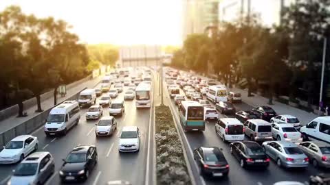 Big avenue in the a city crowded of cars