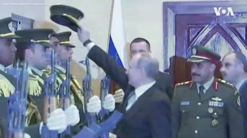 Putin Replaces the Dropped Cap of Palatinian Honor Guard