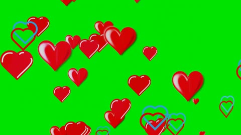 Red hearts animation on green background.