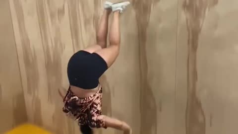 Girl Falls to The Ground Trying a Pull Over a Trampwall