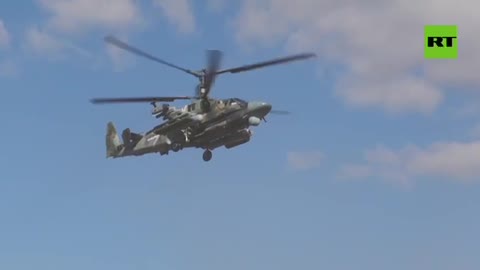 Daily work of the Ka-52 "Alligator" work on armored vehicles of the Armed Forces