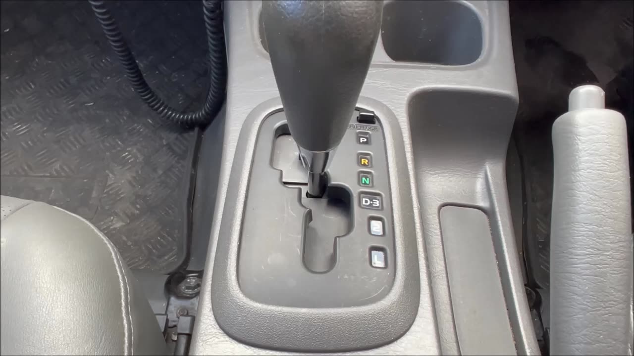 How to Override the Transmission Shift Lock Lever on a 2013 Toyota Hilux 150 SER