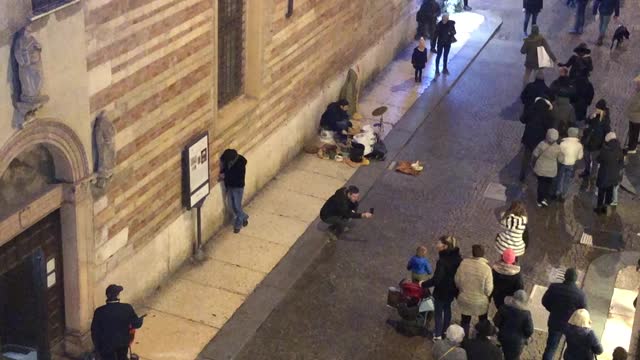 Verona Bucket Street Musician Draws Crowds