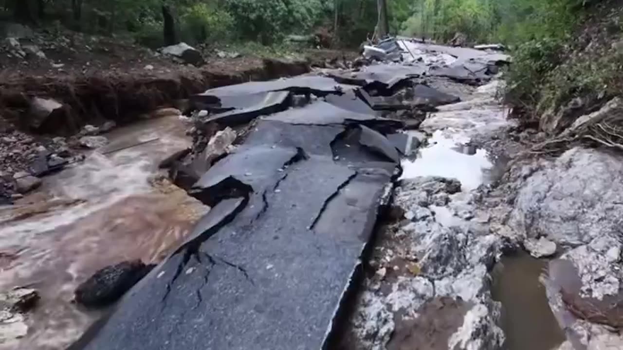 Entire roads in North Carolina are washed out and people are without a way ...