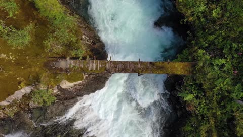 suspension bridge over the mountain river beautiful nature norway natural landscape