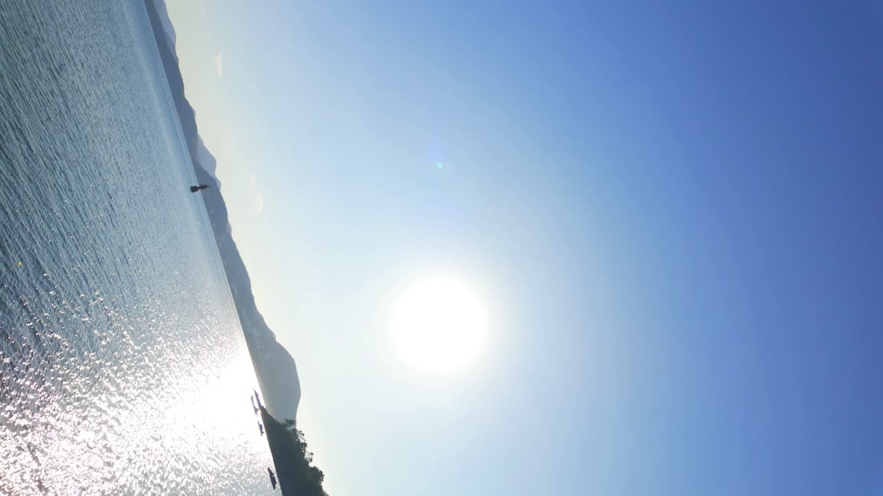 Sunny 180-Degree Panoramic View of the Coastline