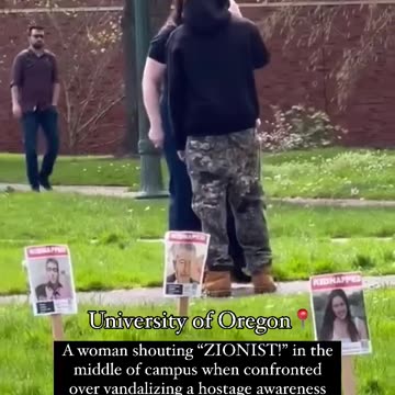 Students at University of Oregon throw posters of kidnapped Israeli hostages to the floor.