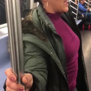 Woman on subway intercom talking about vaping men