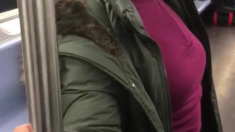 Woman on subway intercom talking about vaping men