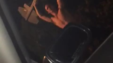 Guy throws stop sign and it falls over onto him