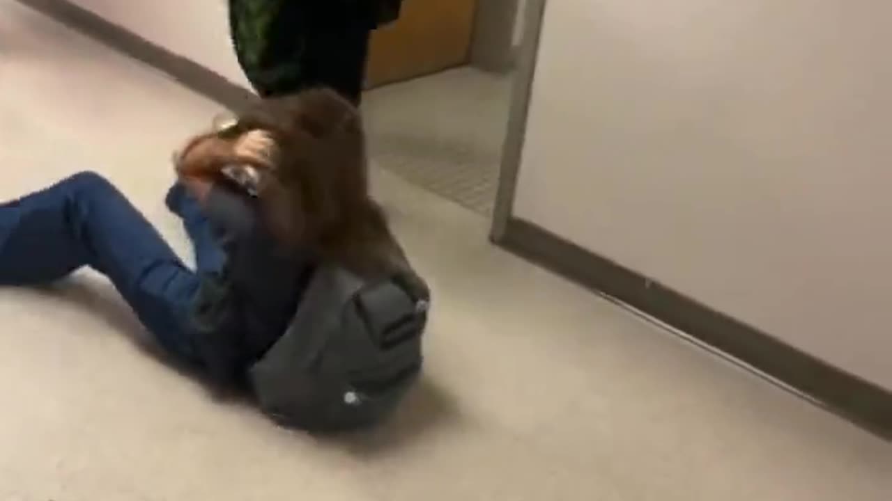 Transgender male student seen beating up a female student