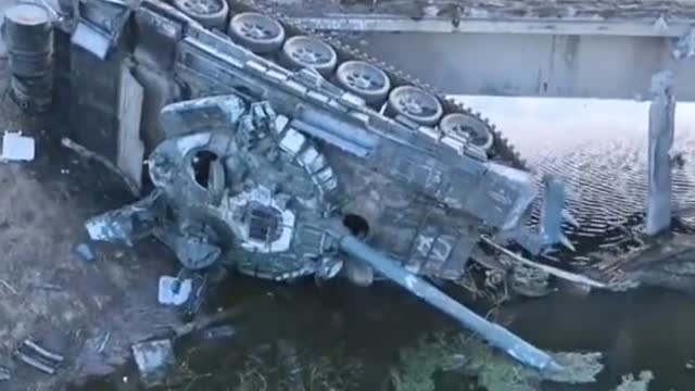 Russian T-72B Tank Fell Off Bridge In Ukraine