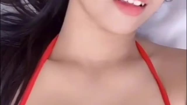 a woman is enjoying music, looks beautiful
