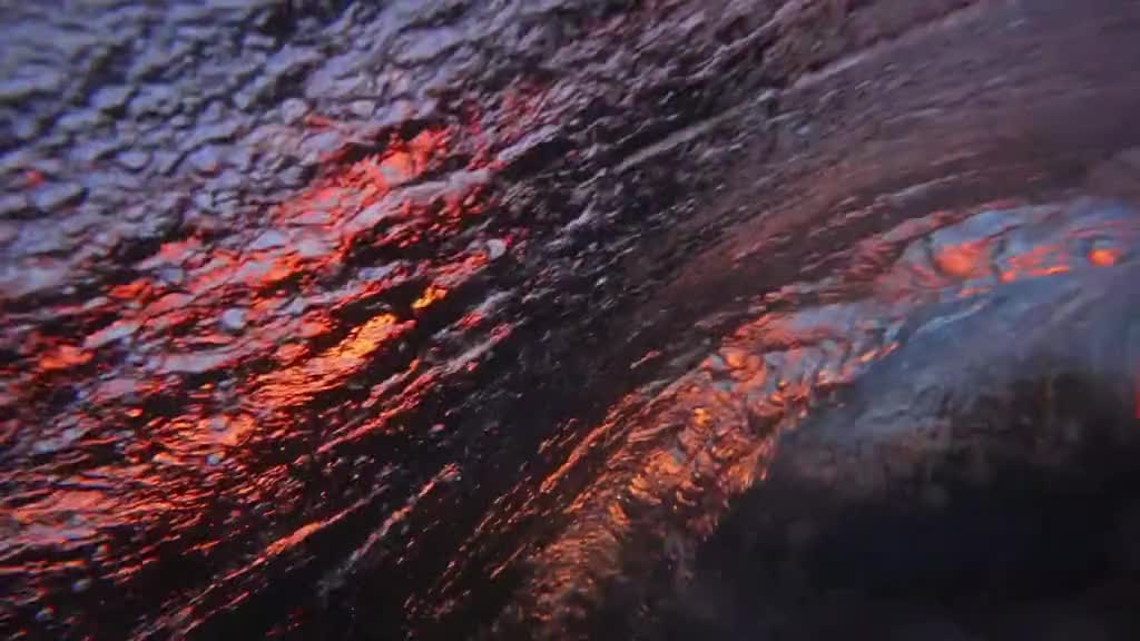 The waves under the sunset glow