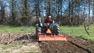 ROTOTILLING OUR GARDEN SOIL FOR PLANTING