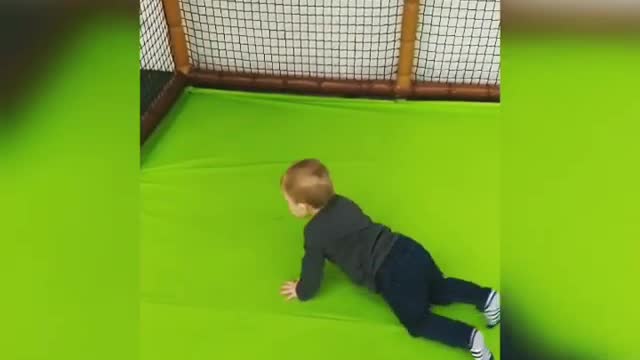 Collab copyright protection - baby boy kicks ball faceplants goal